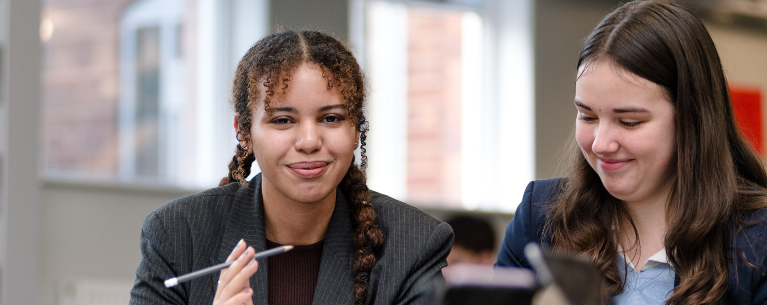 two girls studying at school